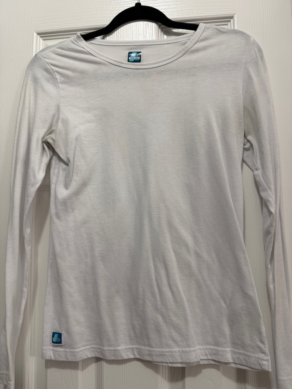 Ada White Crewneck Tee with Subtle Logo Patch